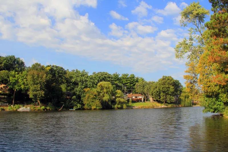 Woods Creek Lake in Lake in the Hills, Illinois with tree-lined shores and waterfront homes